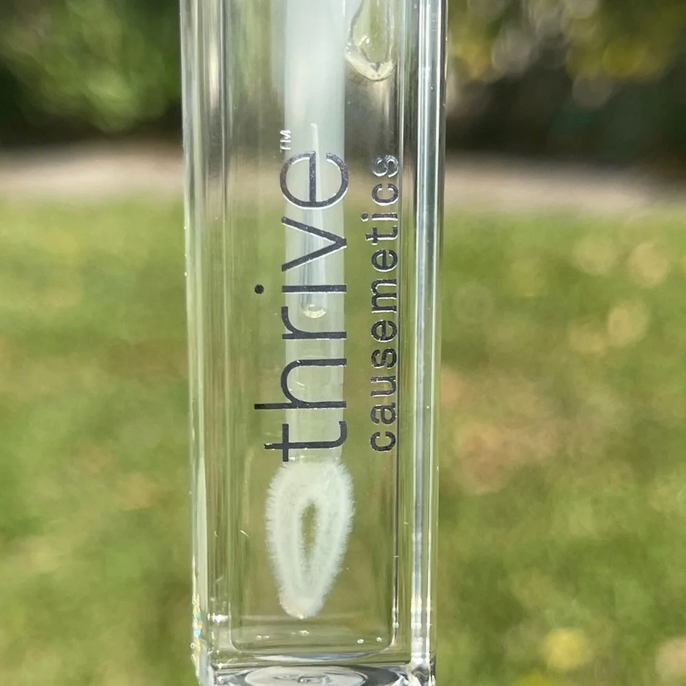 THRIVE CAUSEMETICS Pout Hero Clear Lip Gloss Balm In Vanilla Swirl